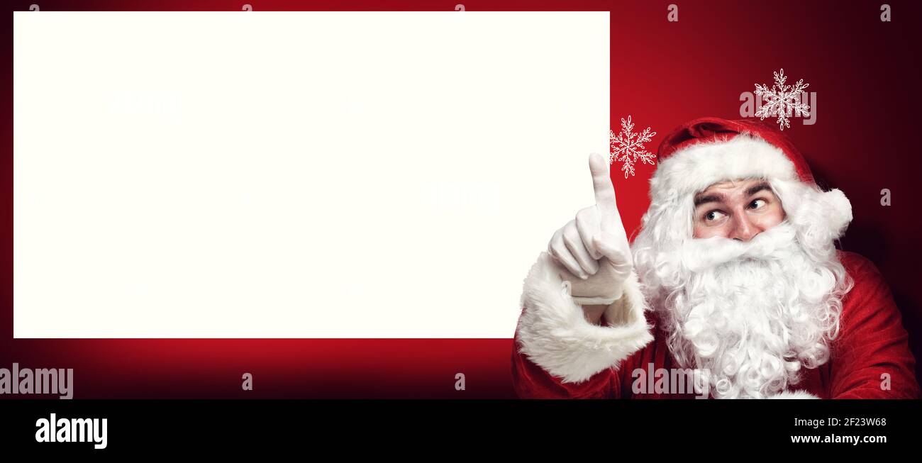 Happy santa claus pointing blank hi-res stock photography and images ...