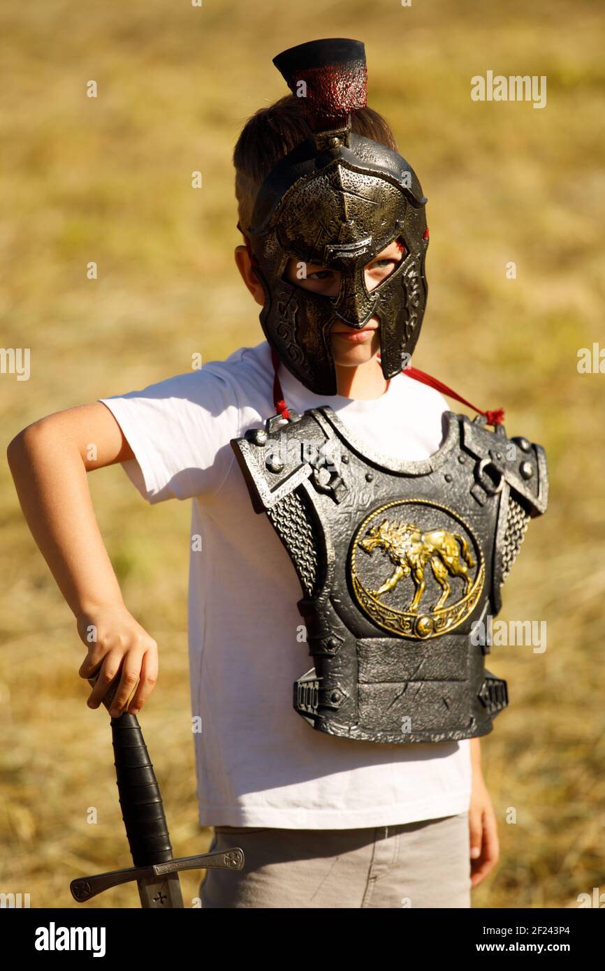 Russia. Vyborg. 08.20.2020 a child in toy medieval armor with a sword Stock Photo