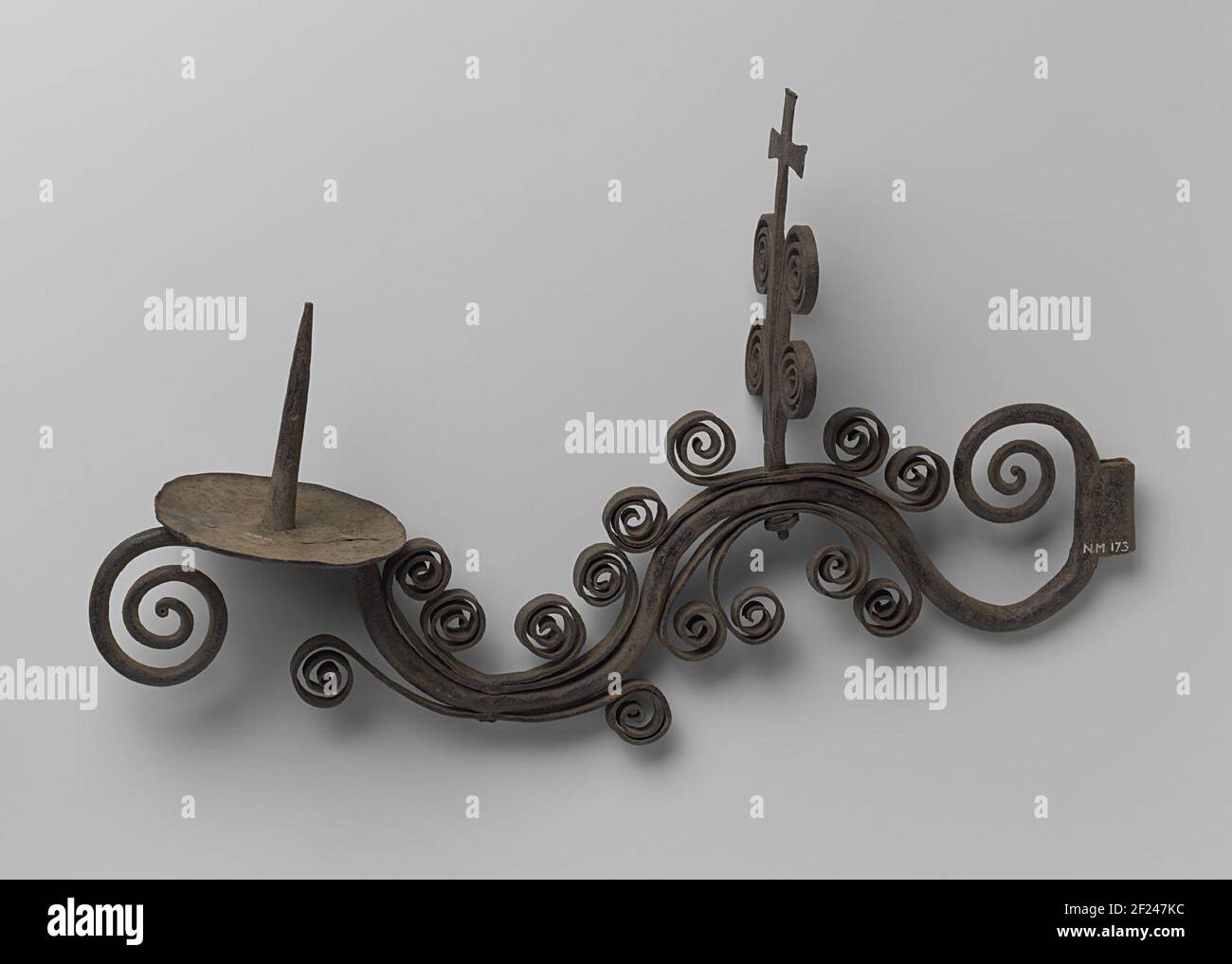 Iron forged wall brace Stock Photo - Alamy