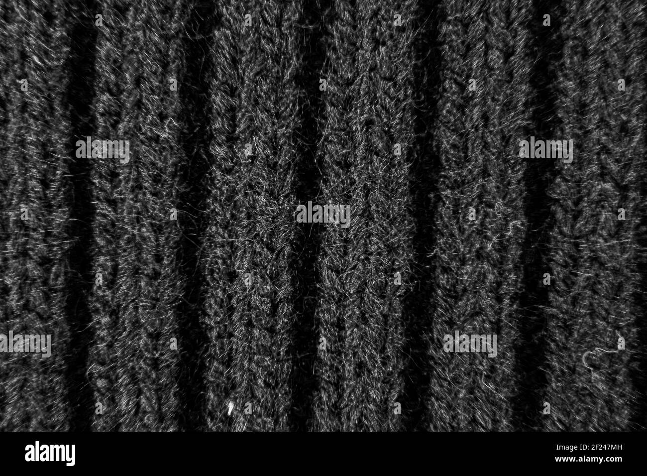 Image of black and white fabric background of woolen look Stock Photo