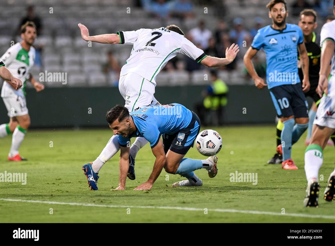 10th March 2021; Netstrata Jubilee Stadium, Sydney, New South Wales, Australia; A League Football, Sydney Football Club versus Western United; Kosta Barbarouses of Sydney goes down in the penalty area after a heavy challenge from Aaron Calver of Western United leading to a penalty kick for Sydney Credit: Action Plus Sports Images/Alamy Live News Stock Photo