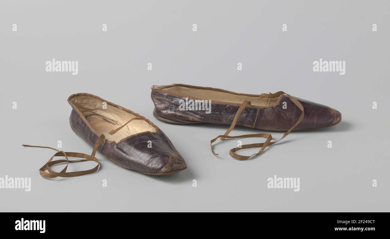 Shoe of golden corner with straight cut nose and without heel and cross  tires of brown ribbon.Shot from Golden Corn Leather. Left / Right Equal.  Model: Right Cut Nose. No whole. Crocklet