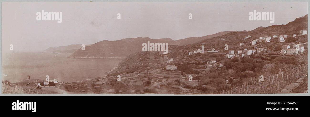 View of a village by the sea with a genuese tower on corsica.part of a French amateur photographer Photo album with sights in France, Switzerland and Italy. Stock Photo