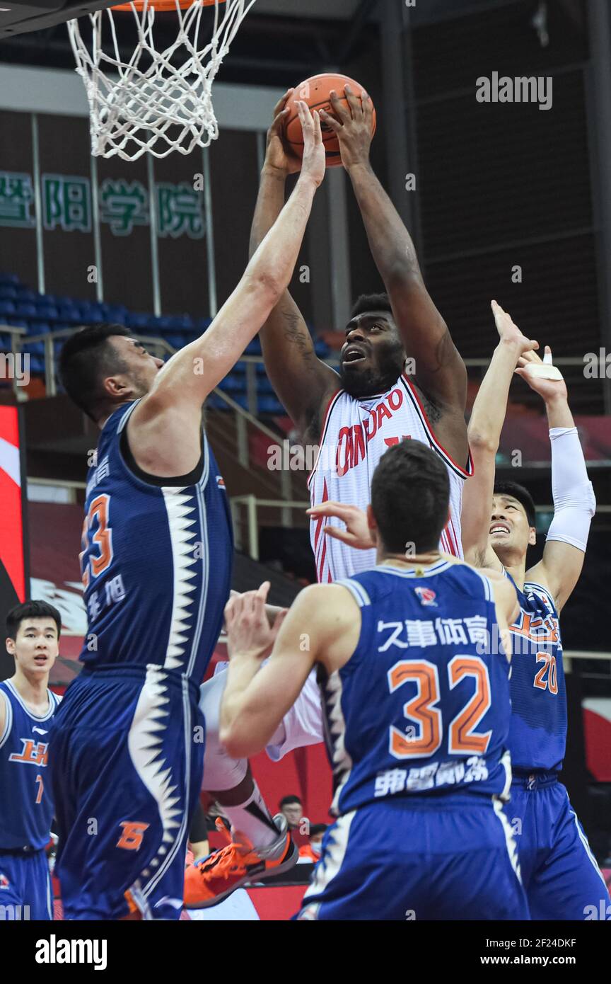 Zhuji, China's Zhejiang Province. 10th Mar, 2021. Dakari Johnson (Top R