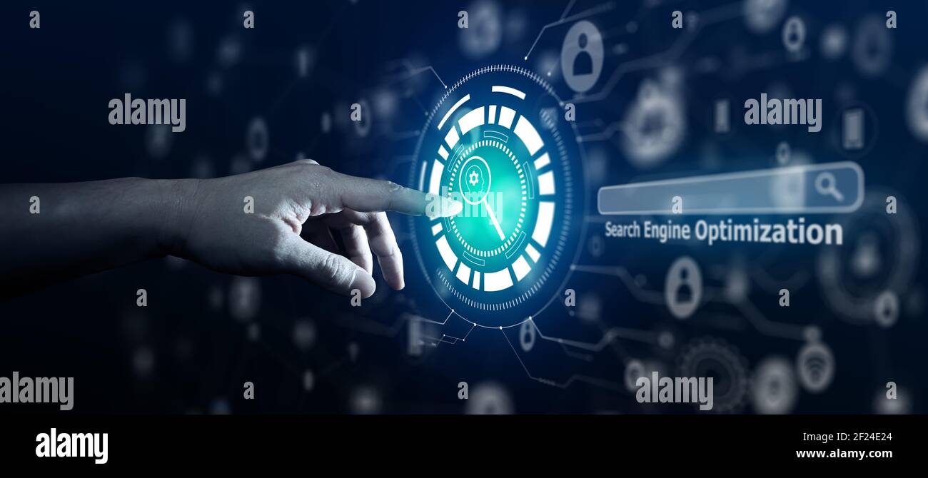 Search Engine Optimisation - SEO - Businessman using Search Engine on virtual screen. Stock Photo