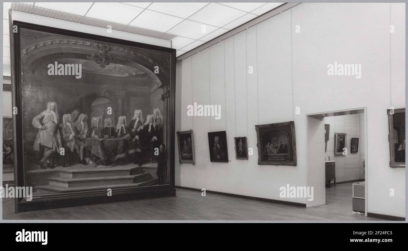 Room 136 with paintings by Cornelis Troost, left a large painting on a panel; Drucker extension, December 1992.Left 'The Regents of The Aalmozenweeshuis in Amsterdam', on the right the passage to saloon 137. Stock Photo