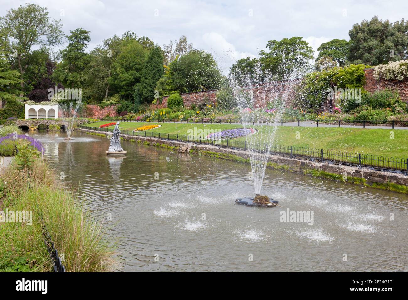 Summer view of the fountains and flower display in the Canal Garden in Roundhay Park, Leeds, West Yorkshire Stock Photo