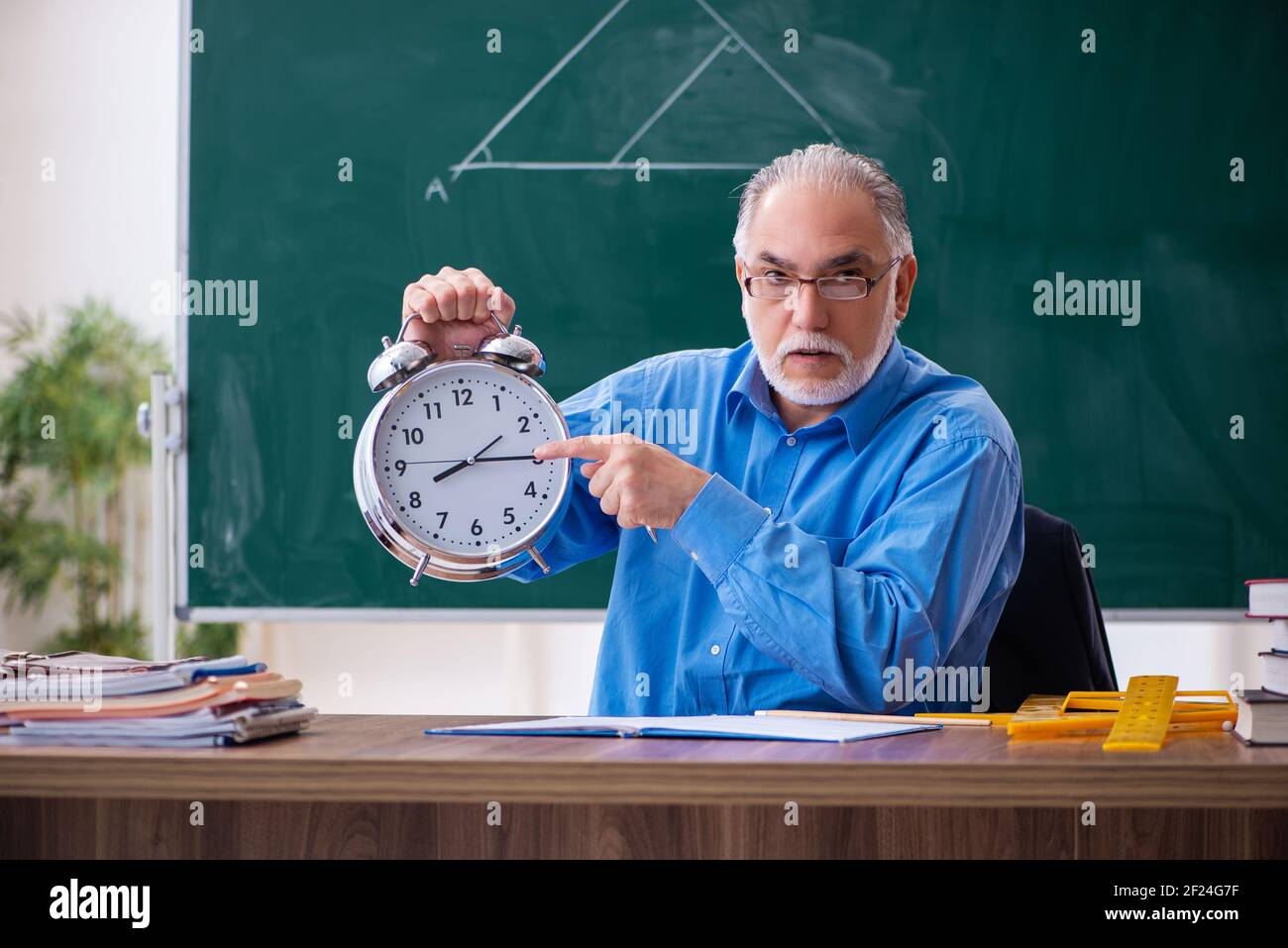 Old male geometry teacher hi-res stock photography and images - Alamy