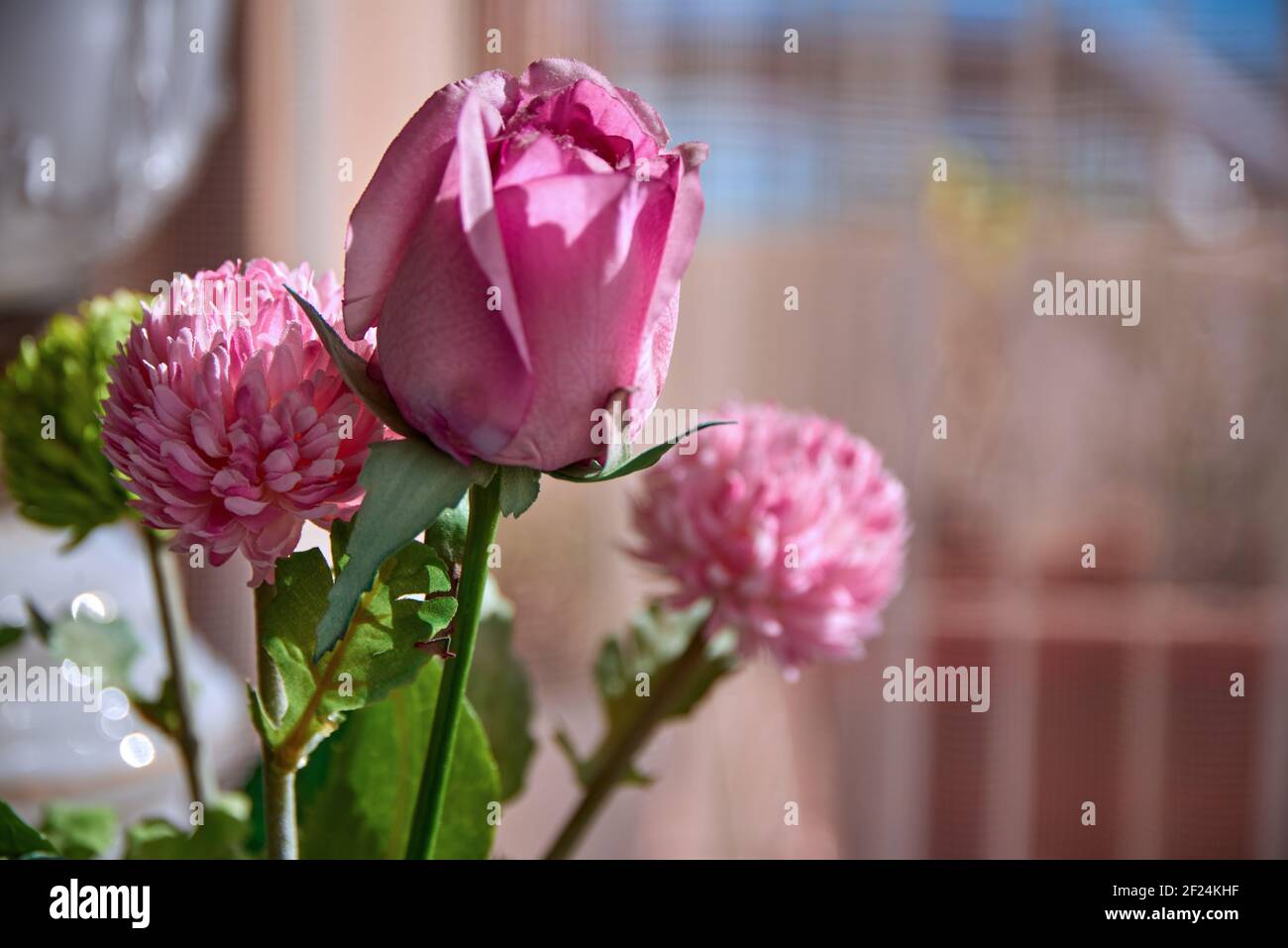 Artificial roses in detail, perfect replicas of natural roses Stock