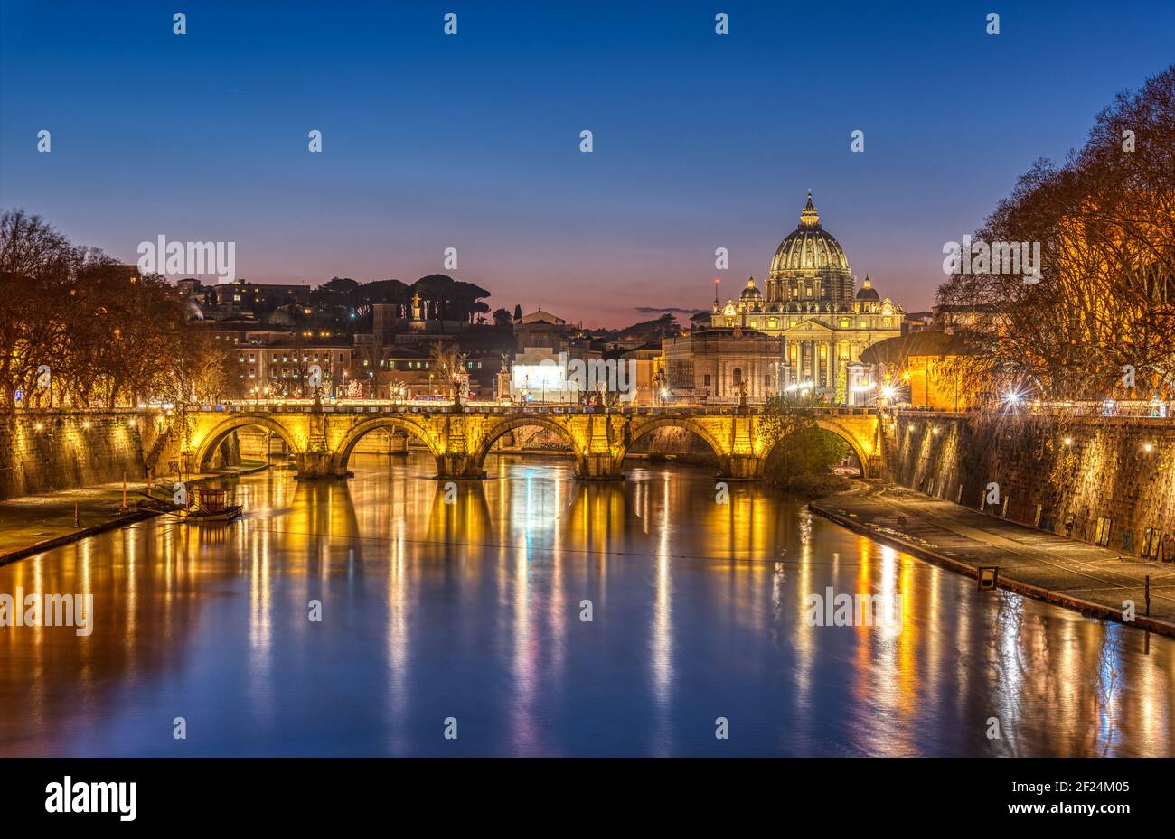The Tiber river and St. Peters Basilica in the Vatican City, Italy, at twilight Stock Photo