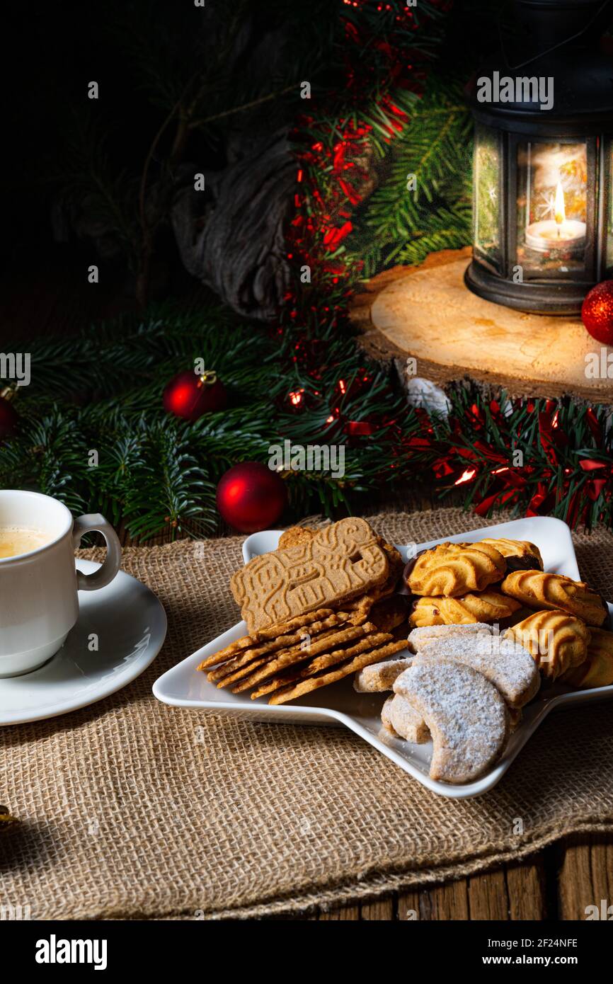 Different types of biscuits with rustic Christmas decorations Stock Photo