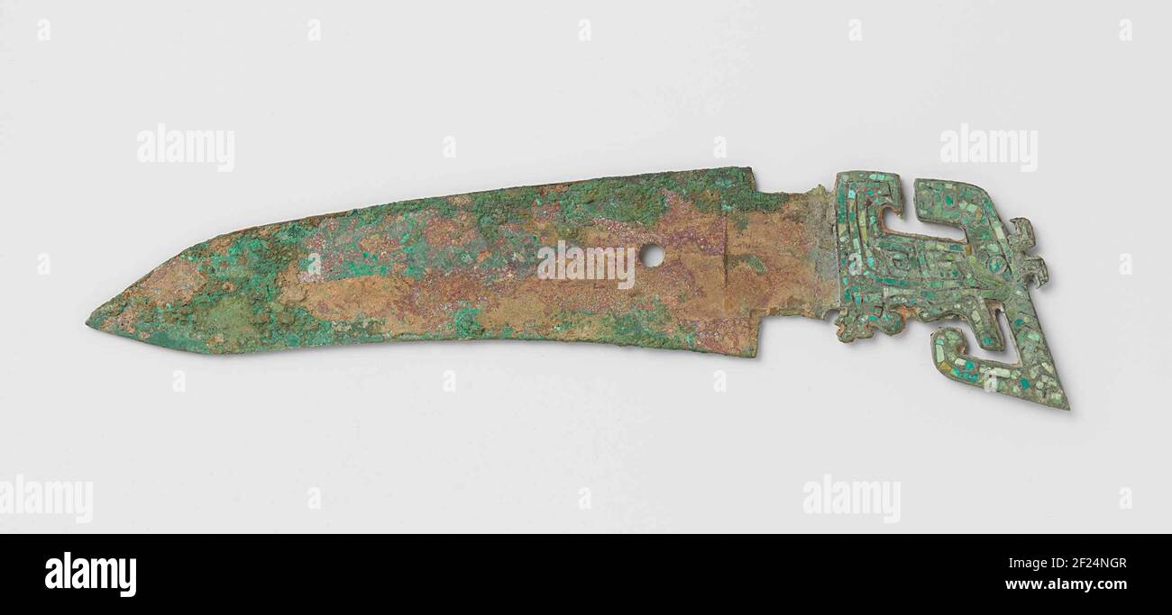 Two dagger-axes.This kind of broad, dagger-like blade was affixed at a ...