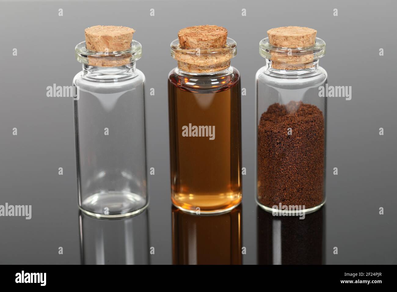Number of small glass bottles with powders and liquids Stock Photo Alamy