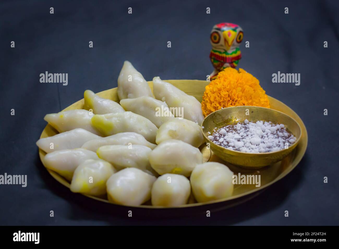 delicious bengali rice flour coconut dumpling served during bengali