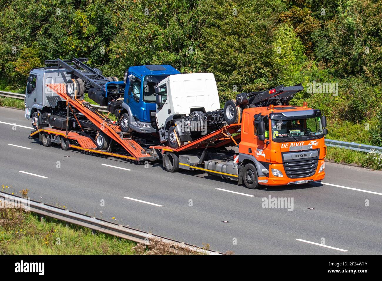 De Rooy Leyland Haulage delivery trucks, lorry, transportation, truck, cargo carrier, new DAF tractor units, European commercial transport, industry, M61 at Manchester, UK Stock Photo