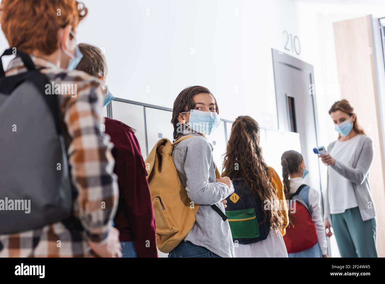 Children queue school hi-res stock photography and images - Alamy