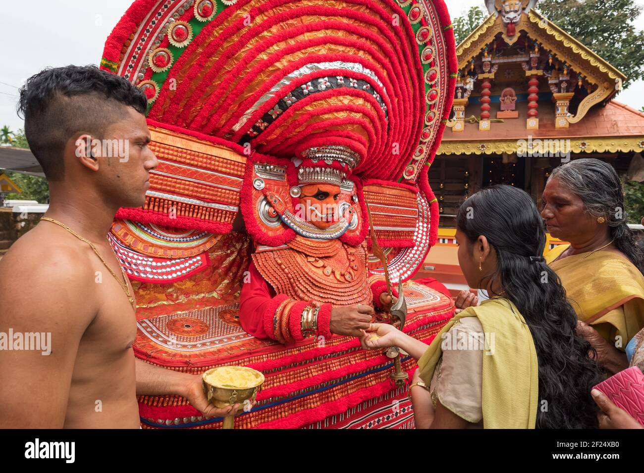 Kannur, India December 2, 2019 Theyyam artist perform during temple