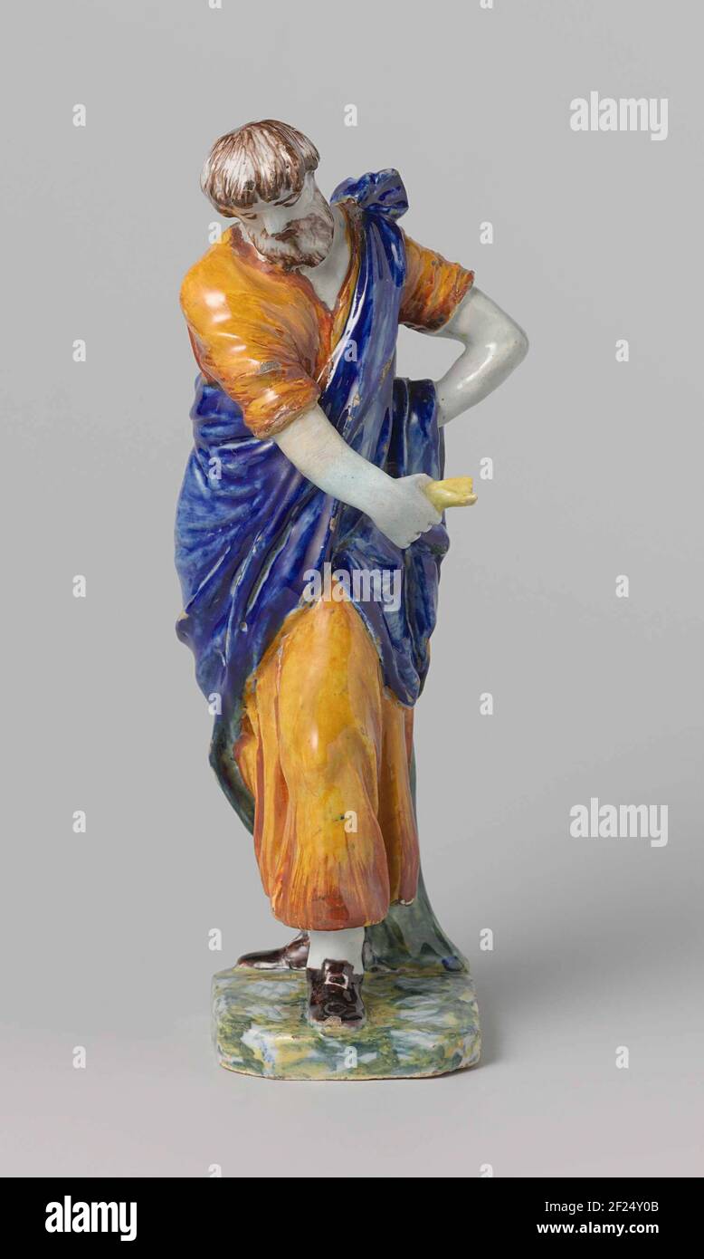 Decoratief object.Men's figure of Faience, representing an apostle with ...