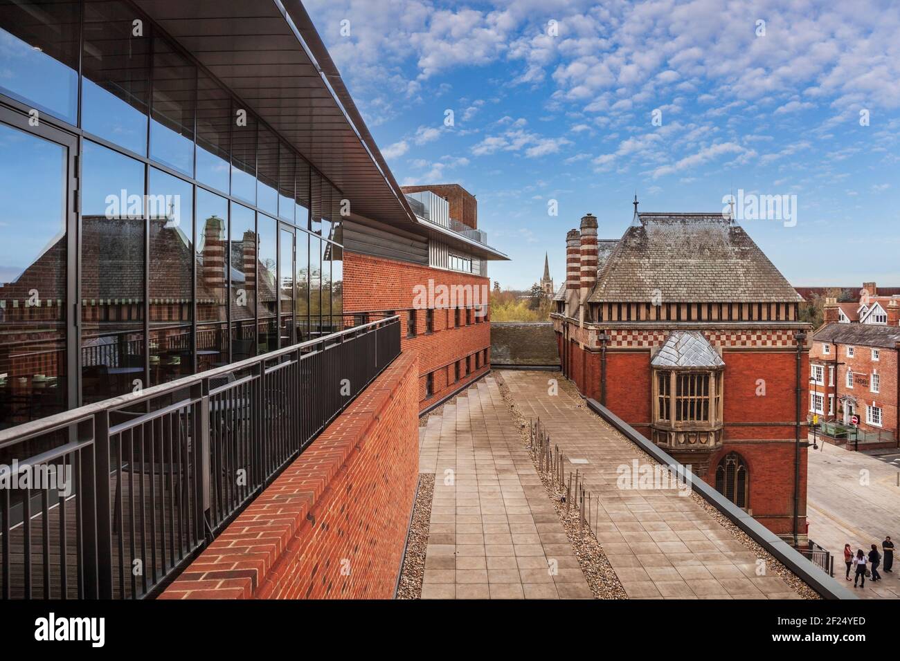 A view of the Swan Theatre from the roof of the Royal Shakespeare Theatre in Stratford On Avon with Holy Trinity Church in the distance, England Stock Photo