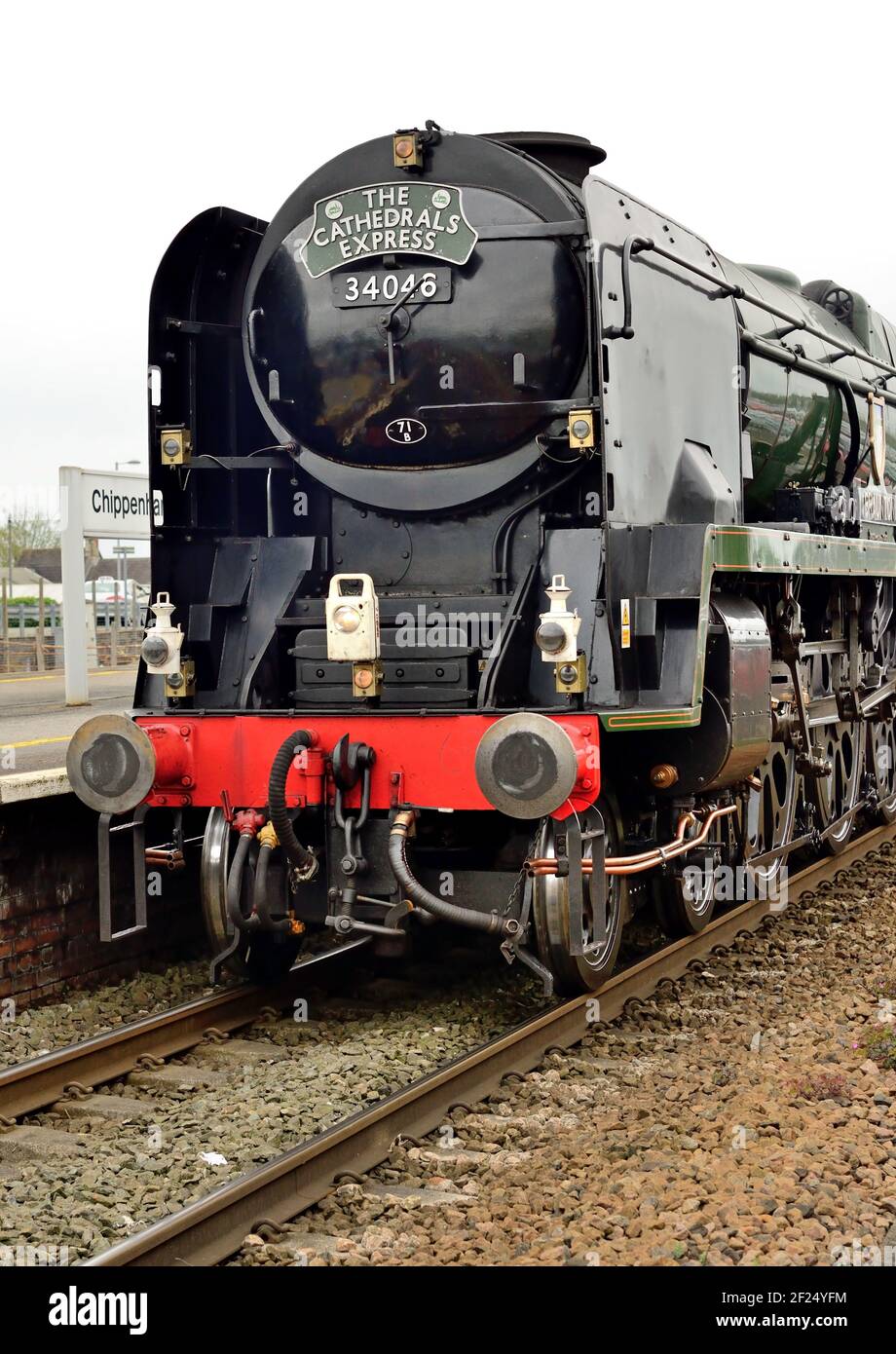 Rebuilt West Country Pacific No 34046 Braunton stops at Chippenham station while hauling the Cathedrals Express St George's Day railtour. 23.04.2014. Stock Photo