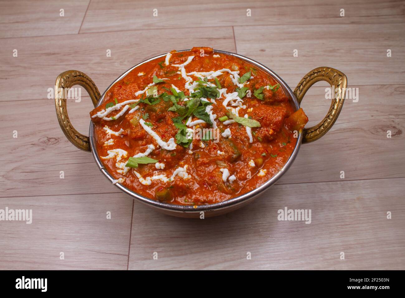 https://c8.alamy.com/comp/2F2503N/overhead-view-of-veg-kadai-or-veg-curry-roast-hot-and-spicy-gray-dish-mumbai-delhi-india-north-indian-pakistani-non-vegetarian-cuisine-prepared-in-g-2F2503N.jpg