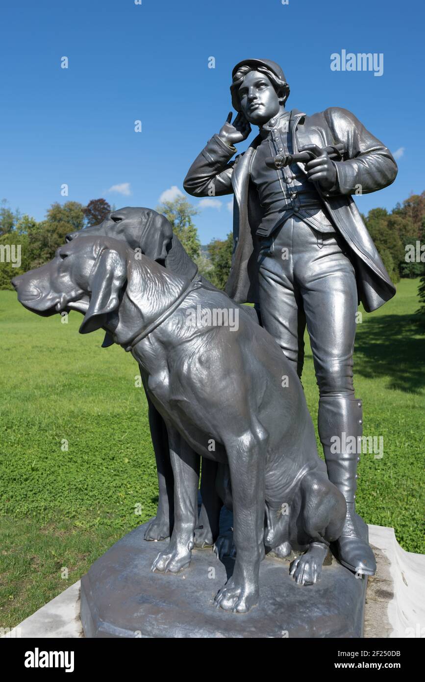 Statue of a Man and Two Dogs at the Imperial Kaiservilla in Bad Ischl Stock Photo