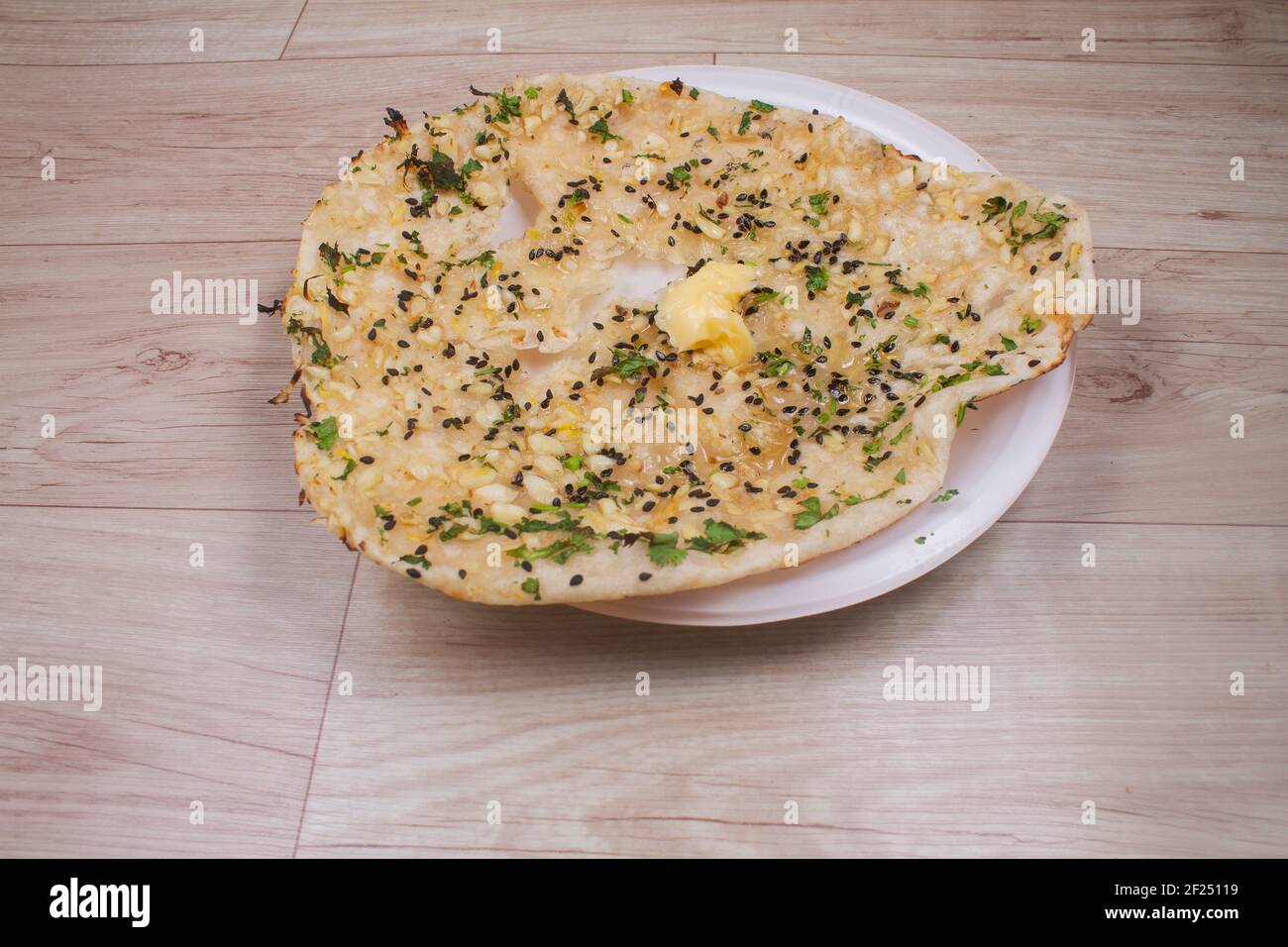 indian special flat bread also known as butter tandoori roti or naan ...