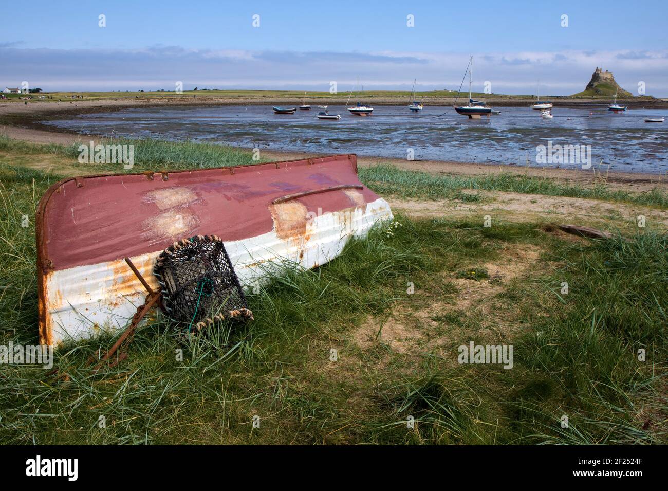 Upturned boat holy island beach hi-res stock photography and images - Alamy