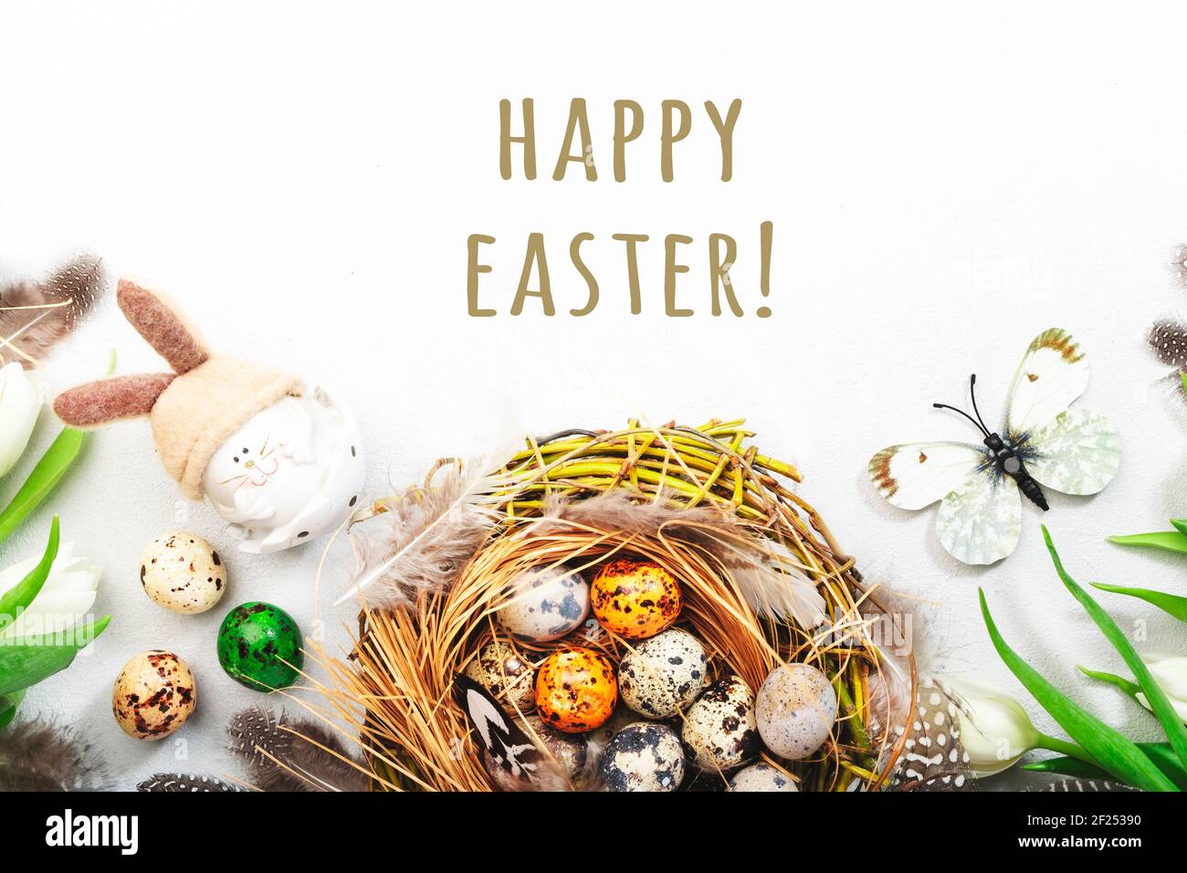 Spring Easter holiday white background with tulips, quail eggs ...