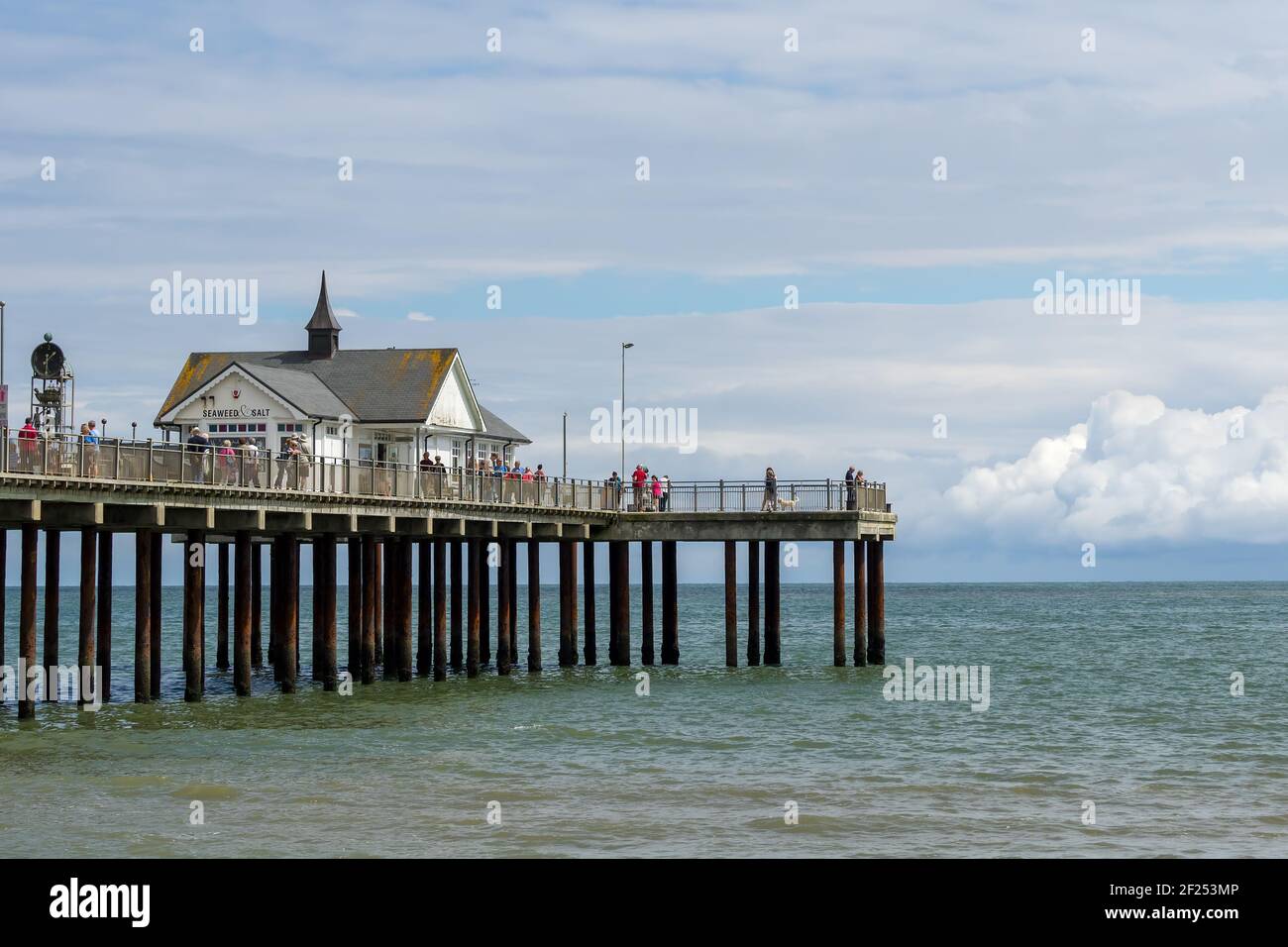 People Enjoying a Sunny Day Out on Southwold Pier Stock Photo