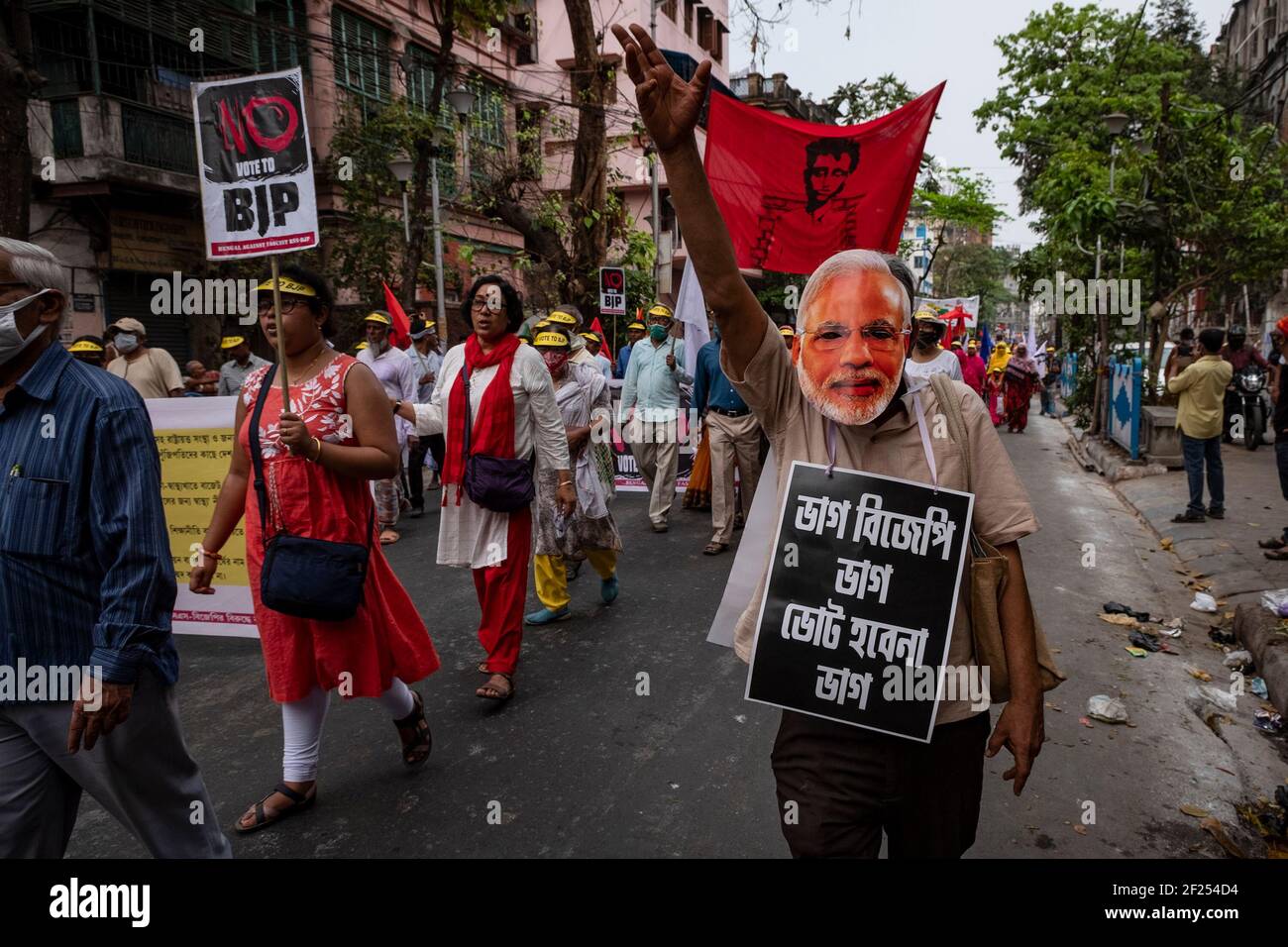 A man wearing a mask of 'Narendra Modi', chants slogans during the anti BJP  rally.A 'NO VOTE TO BJP' rally was staged in Kolkata with the support of  local people, minority groups,