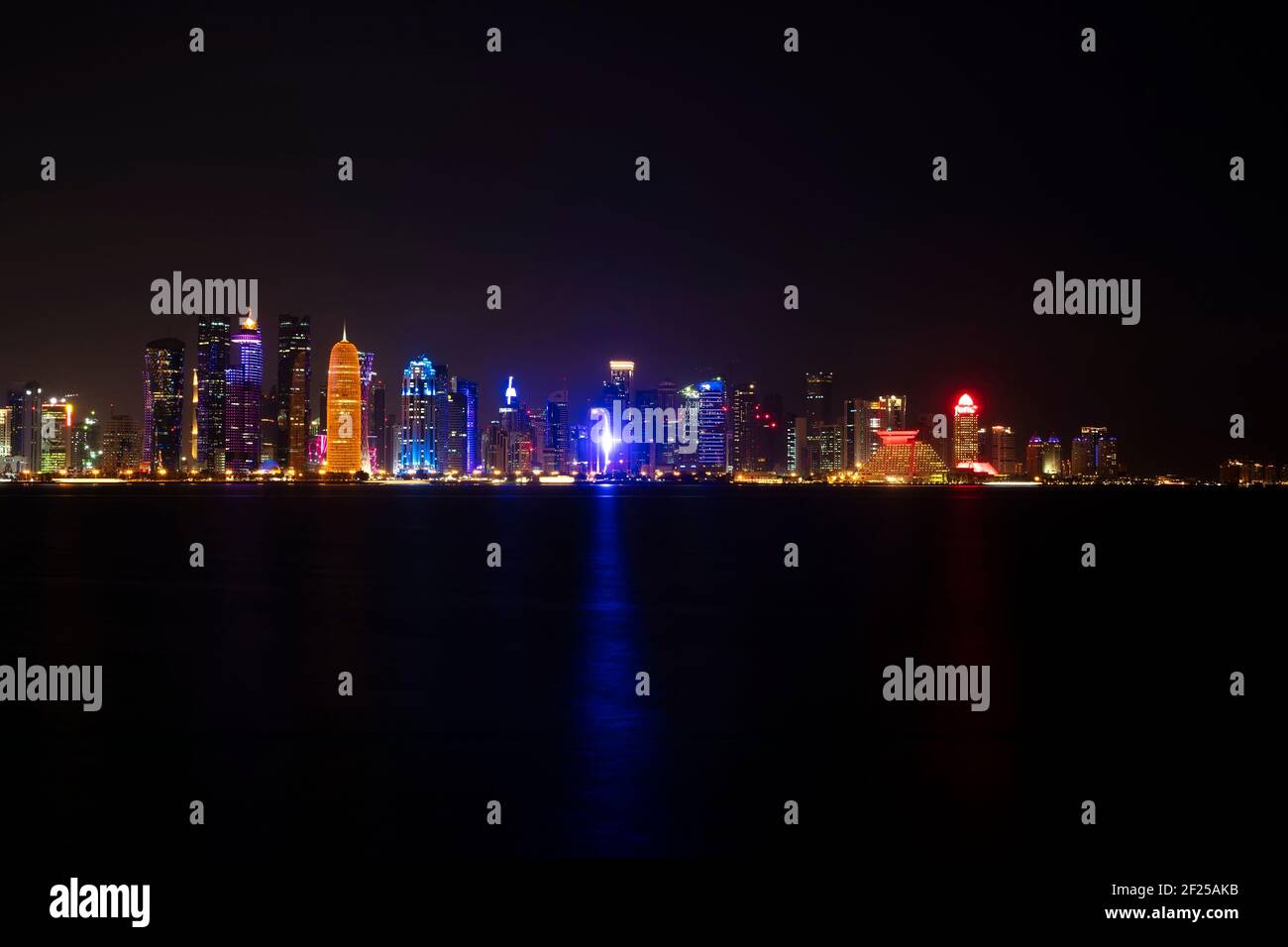 DOHA, QUATAR - JANUARY 21, 2019: View at Doha, Quatar at night. Doha is the capital and most populous city of the State of Qatar Stock Photo
