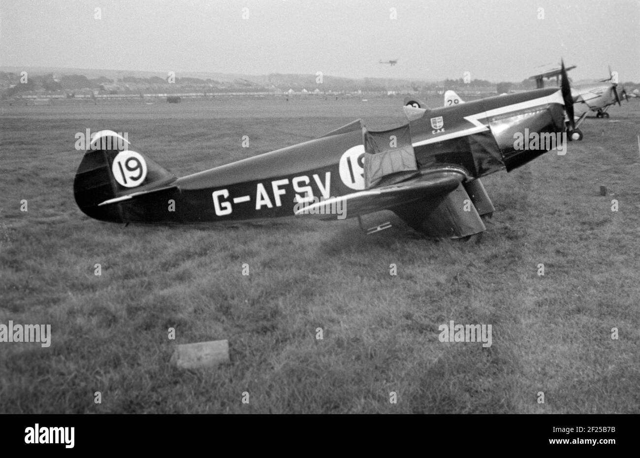 A Vintage 1950s black and white photograph of a Chilton DW. 1A light aircraft, manufactured in England. Registration number G-AFSV. Stock Photo
