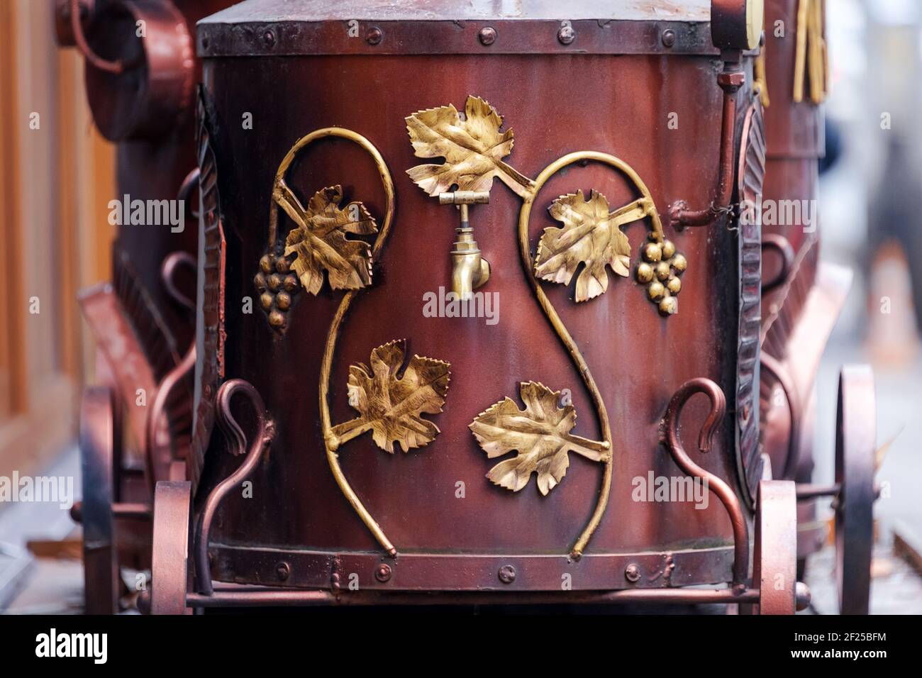 Metal barrel with a tap for wine. Retro style barrel for storing and