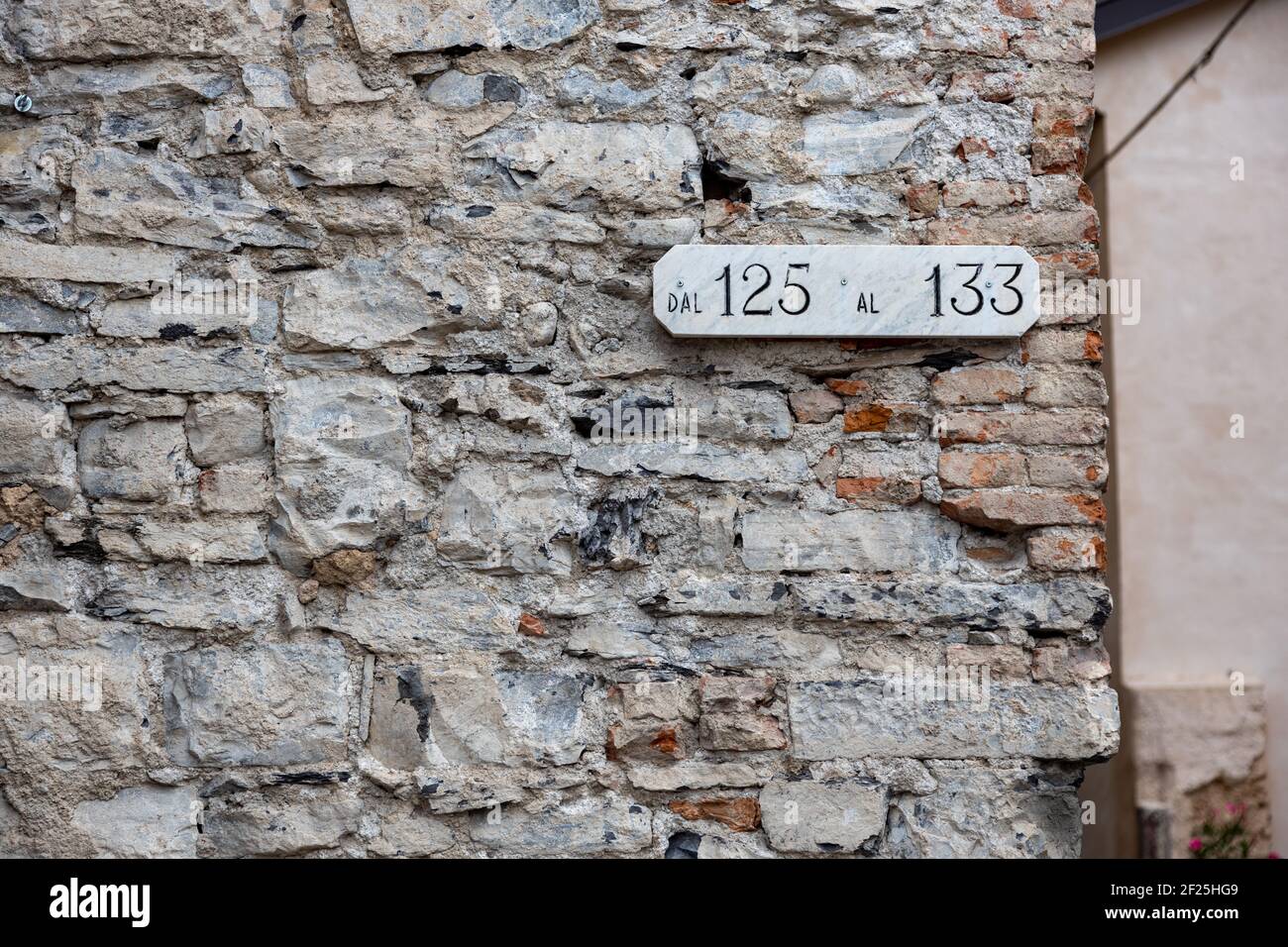 125 133 ancient house number, concept number Stock Photo
