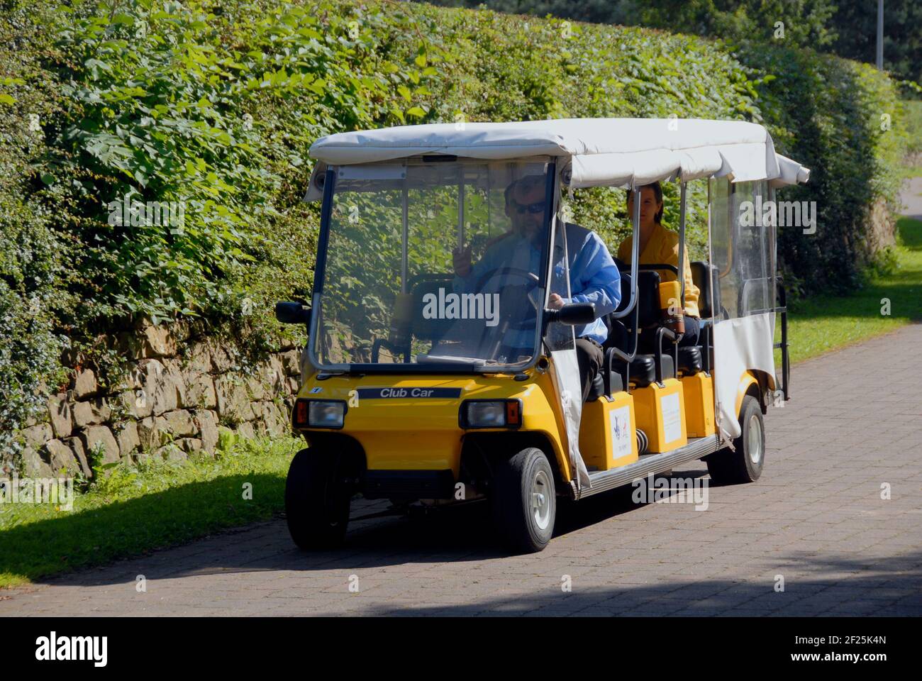 Electric passenger vehicle on the Poet's Path, Ayrshire, Scotland Stock Photo