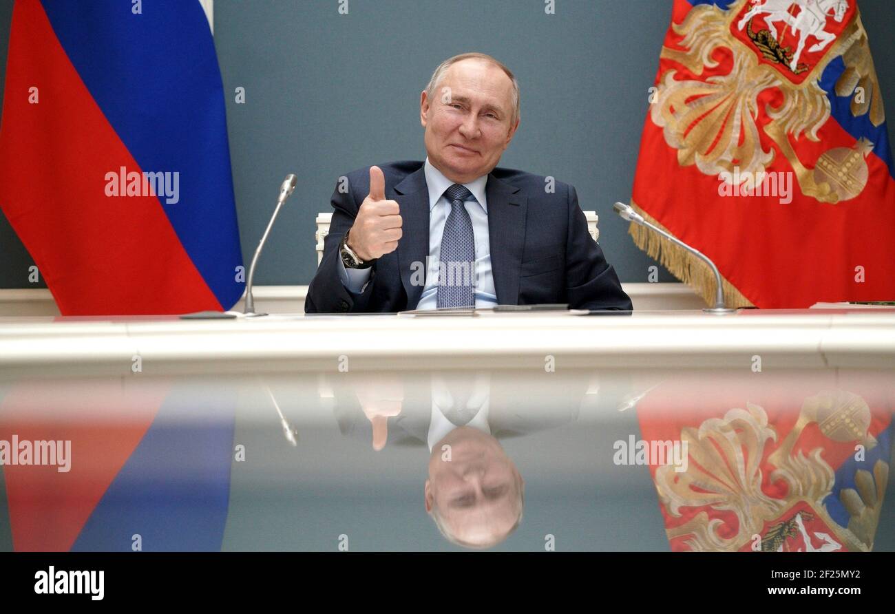 Moscow, Russia. 10th Mar, 2021. Russian President Vladimir Putin, gives a thumbs up to Turkish President Recep Tayyip Erdogan during a virtual ceremonial launch of the construction of the third unit of the Akkuyu Nuclear Power Plant in the Mersin Province of Turkey from the Kremlin March 10, 2021 in Moscow, Russia. Credit: Planetpix/Alamy Live News Stock Photo