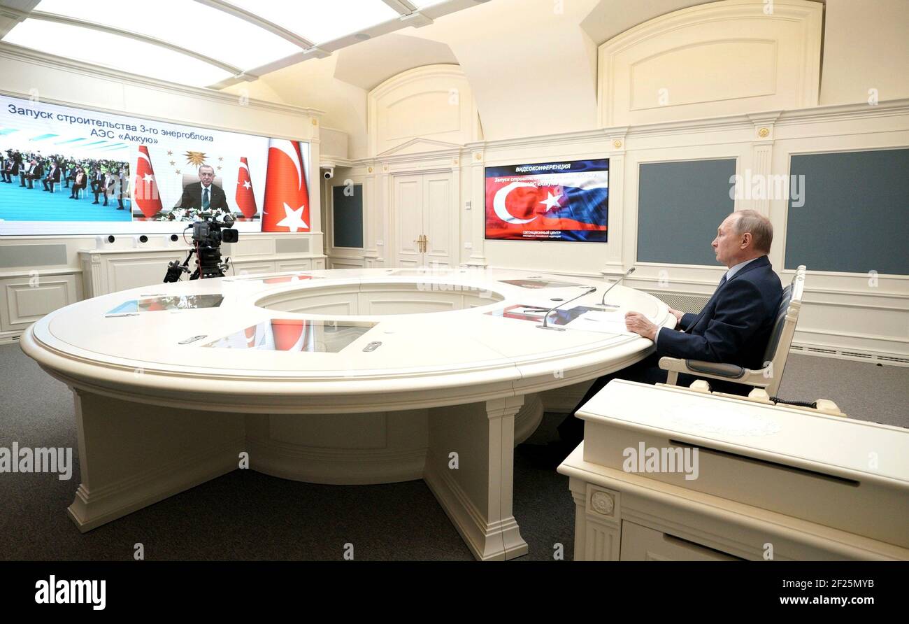 Moscow, Russia. 10th Mar, 2021. Russian President Vladimir Putin, and Turkish President Recep Tayyip Erdogan take part in a virtual ceremony to launch construction of the Akkuyu Nuclear Power Plant in the Mersin Province of Turkey by video conference from the Kremlin March 10, 2021 in Moscow, Russia. Credit: Planetpix/Alamy Live News Stock Photo