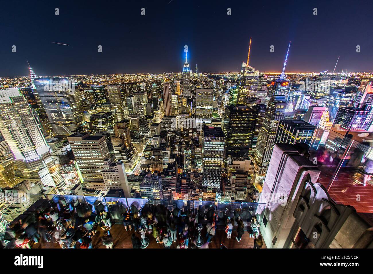 Rockefeller Center Observation Deck people 5 a view of the night view from  the (top of the Rock Stock Photo - Alamy