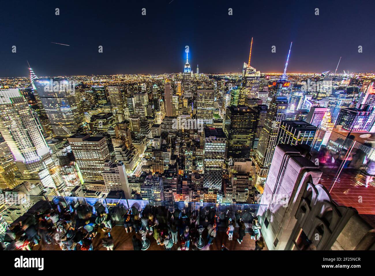 Rockefeller Center Observation Deck people 5 a view of the night view from the (top of the Rock) Stock Photo