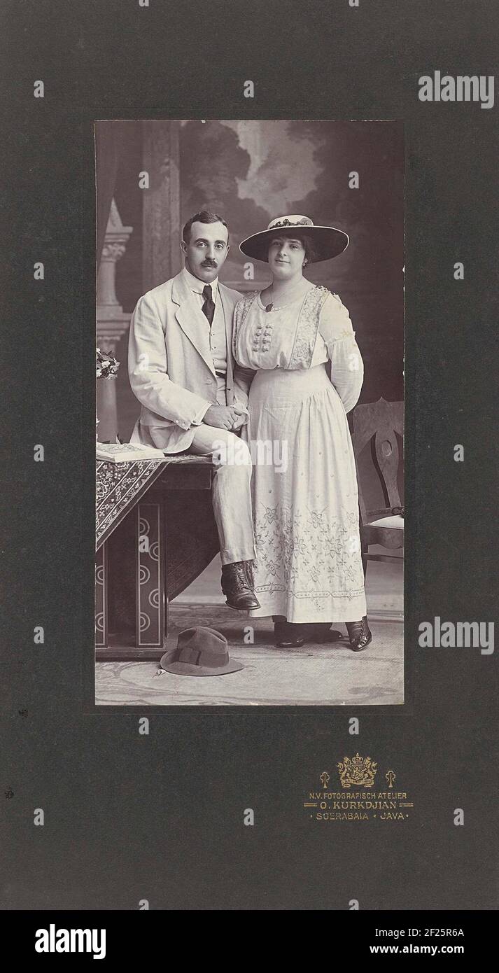 Studio portrait of a young couple Stock Photo - Alamy