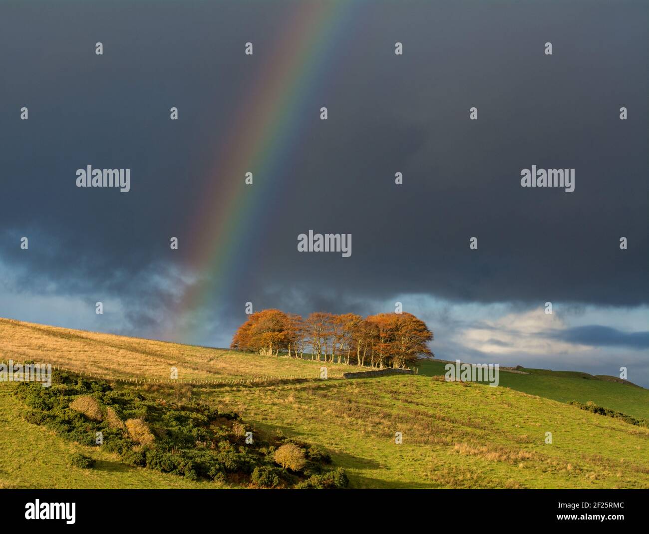 Rainbow over the hills Stock Photo
