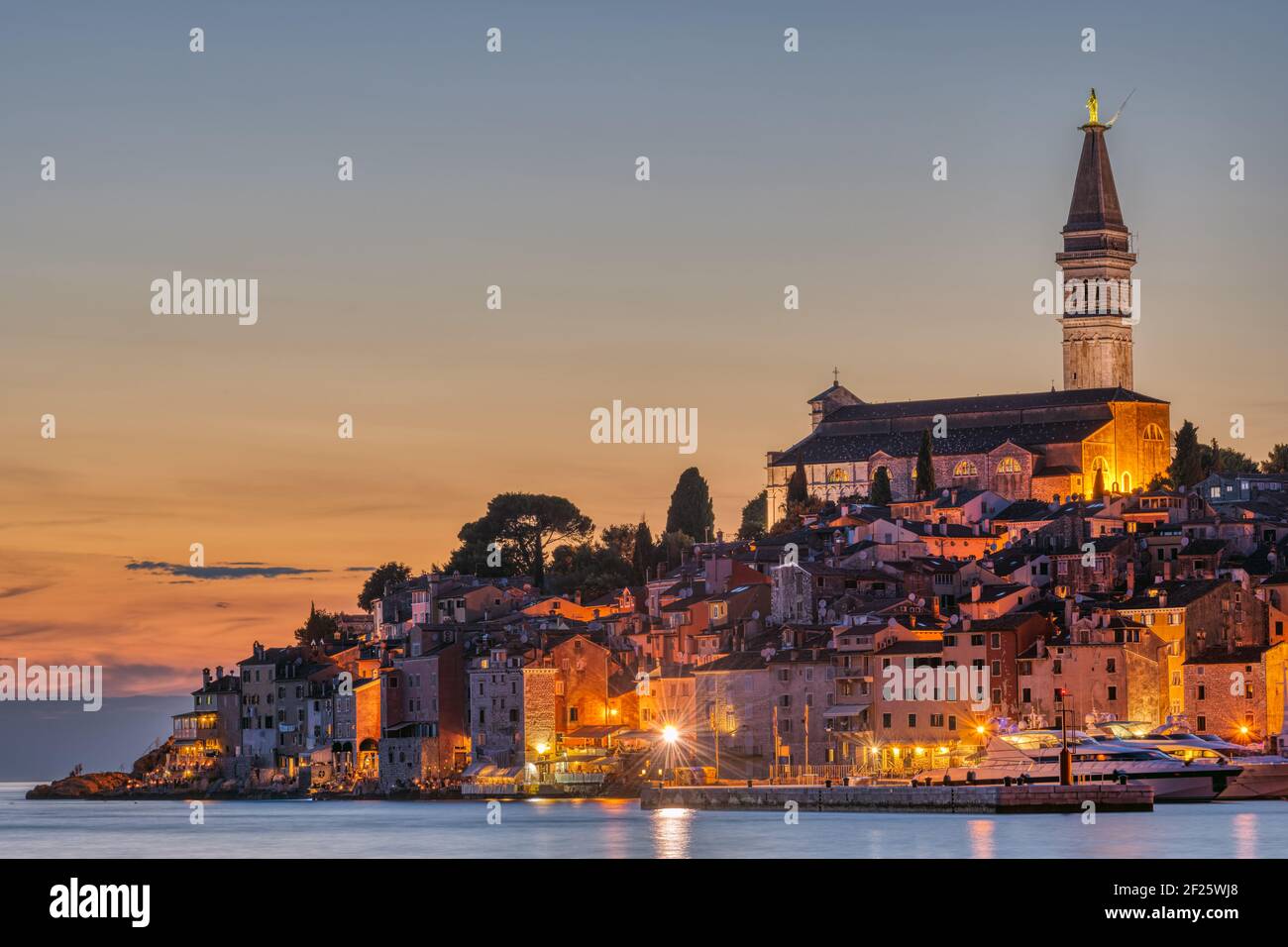 View to the beautiful old town of Rovinj in Croatia after sunset Stock Photo