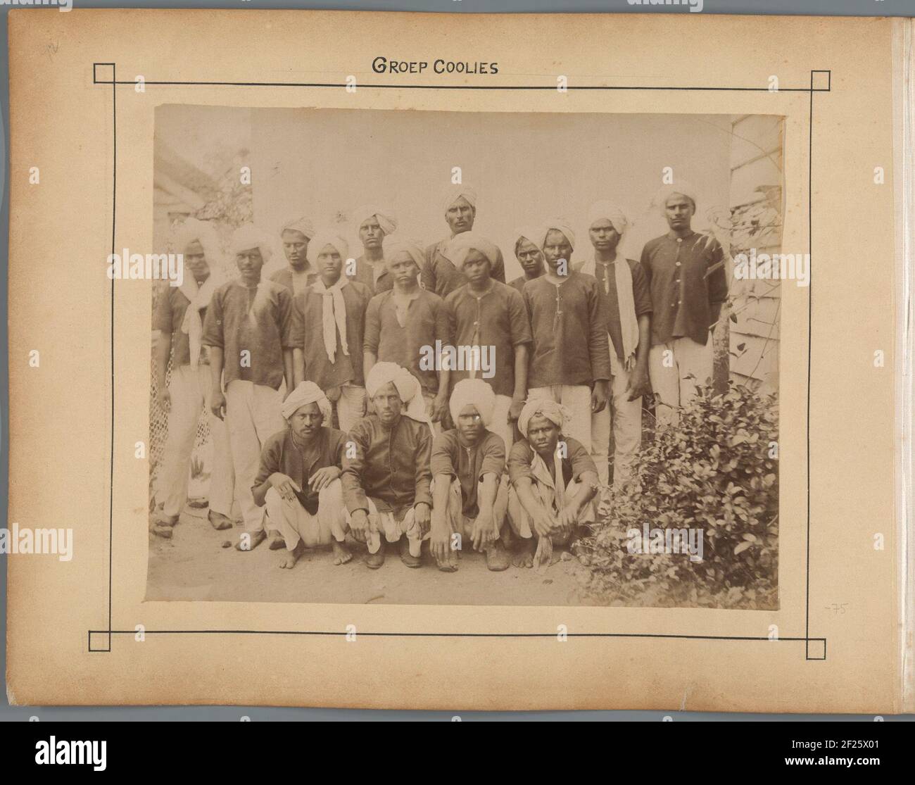 Group of Coolies. Group of contract workers from British India. Stock Photo