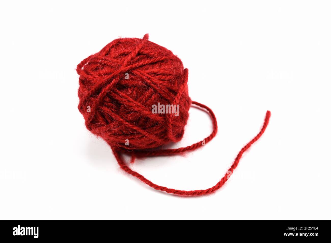 Ball of thread in red, on an isolated white background . High quality ...