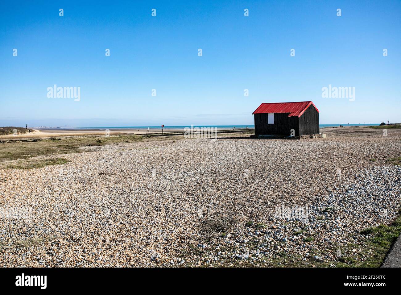 Lonely hut on a beach in E Sussex Stock Photo