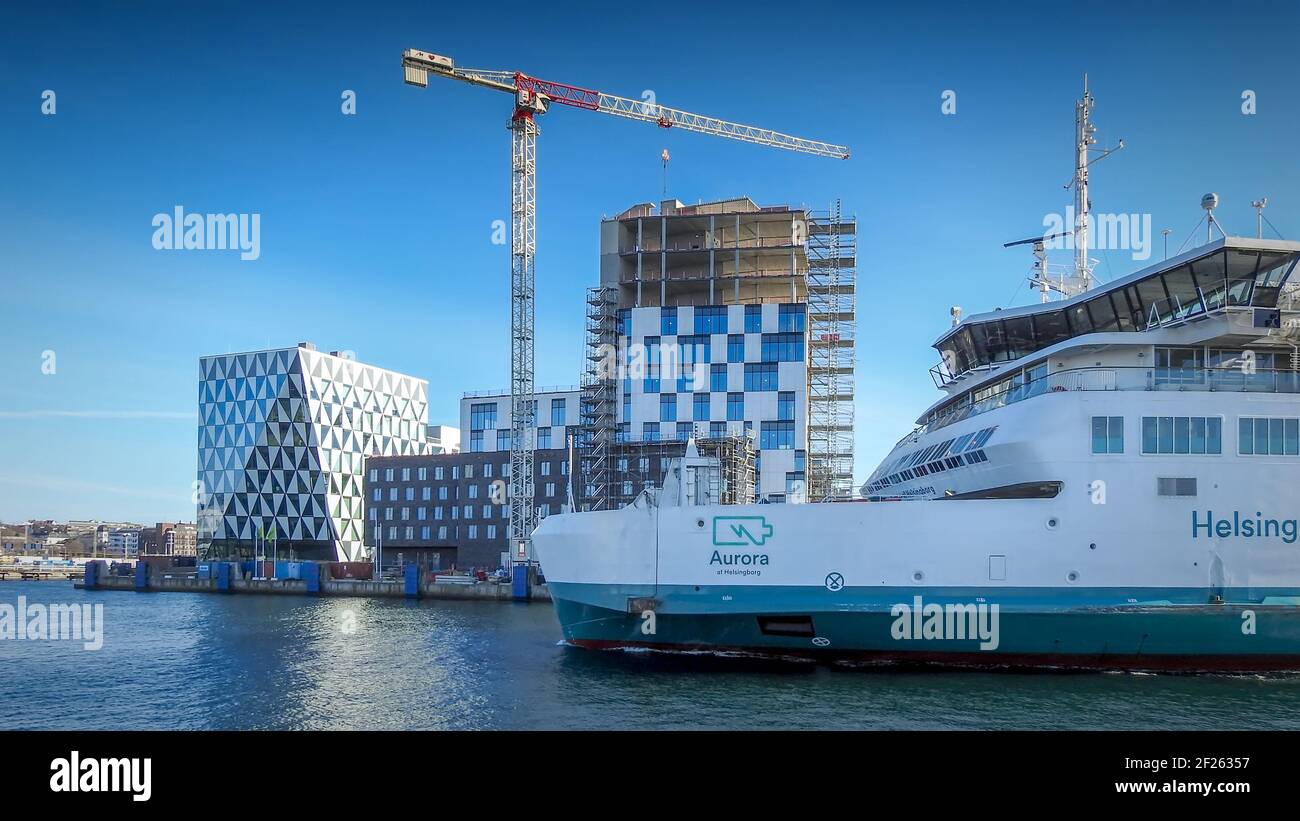 HELSINGBORG, SWEDEN - MARCH 08, 2021: Aurora the battery powered passanger and freight ferry sails into Helsingborg harbour in Sweden. Stock Photo