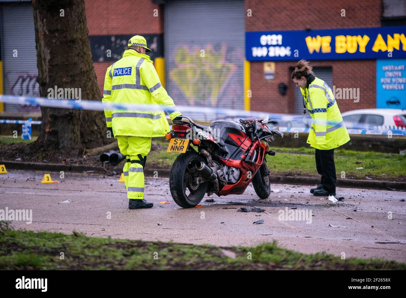 Perry Barr, Birmingham, West Midlands, UK. 10th March 2021: A man in his 50's was seriously injured after his motorbike collided with a tree shortly after midnight on Wednesday. The crash happened on the Aldridge Road section of the A34 heading out of the city towards Great Barr. Specialist collision investigator units were on scene to conduct an investigation before the bike was recovered, and the road reopened. Police are appealing for Dash Cam footage. Credit: Ryan Underwood / Alamy Live News Stock Photo