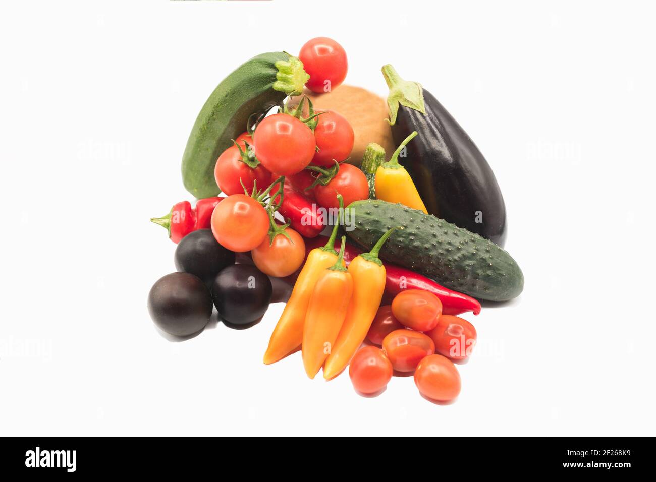 Fresh vegetables and fruits on a white background. Free copy space ...