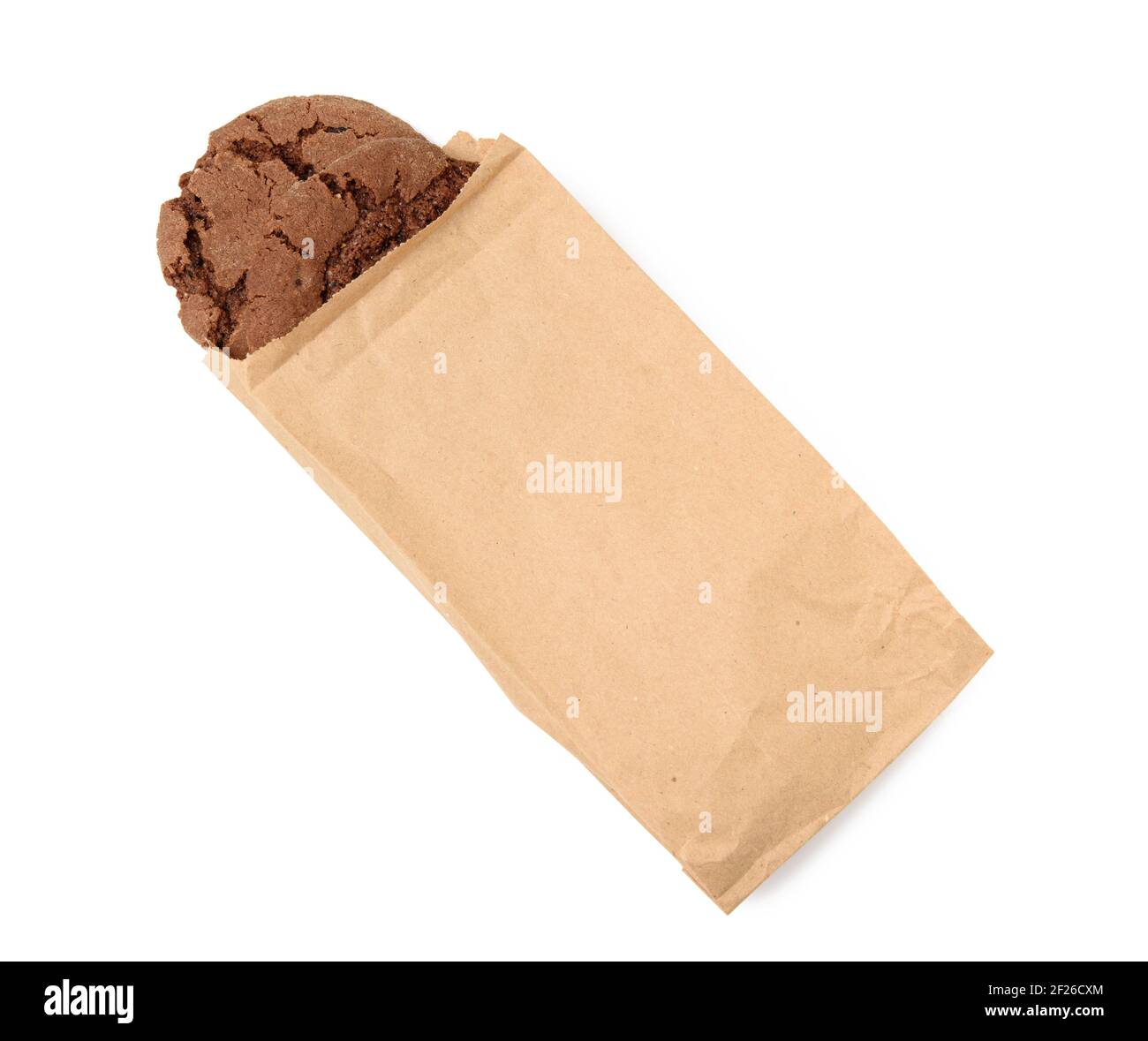 Round chocolate chip cookies in narrow paper brown food bag isolated on white background Stock